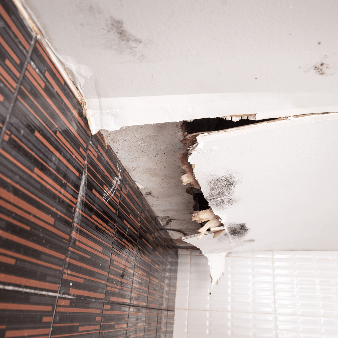 Damaged drywall, causing a split down the middle from a roof leak